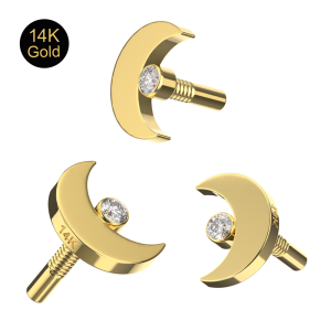 Close-up view of a 14K solid gold 5mm crescent moon top highlighting the central bezel-set round CZ.