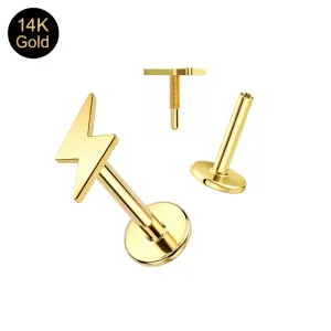 14K solid yellow gold internally threaded lightning bolt labret showing the 7mm bolt top, threaded pin, and smooth hollow 16G post.