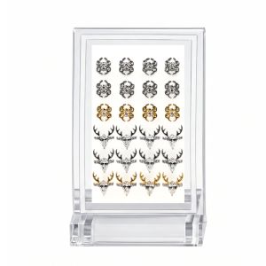 Wholesale assortment of 24pcs G23 titanium deer antler and spider labret studs in gold and silver finishes arranged in acrylic display for piercing jewelry vendors.