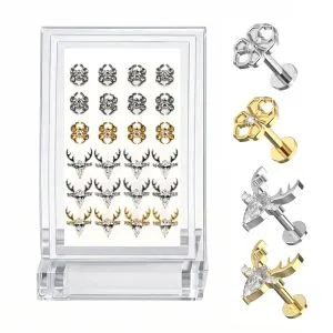 G23 titanium deer and spider labret stud collection in mixed colors with crystal accents shown in retail display with close-up variations for bulk body jewelry supply.

