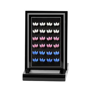 Assorted color variations of G23 titanium triple opal labrets featuring white, pink, and blue opal options in a 24-piece display kit.