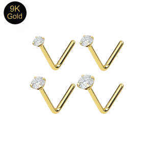 Macro close-up of the 4-prong setting on a 9K solid gold crystal nose stud, highlighting the mirror-finish gold and stone clarity.