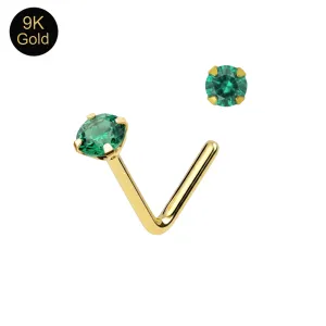 Main product view of a 9K solid yellow gold L-bend nose stud with a 2mm Verdant Emerald CZ in a 4-prong claw setting.