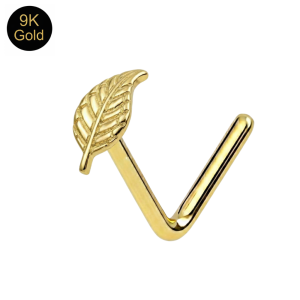 Close-up macro view showing the intricate veining and lustrous mirror-finish on a 9k gold leaf feather nose stud.