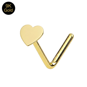 Close-up macro view of the refined gloss finish and artisan-buffed edges on a 9k gold petite heart nose stud.
