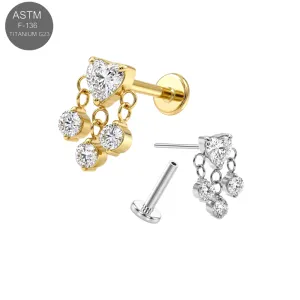 ASTM F-136 implant grade titanium threadless flat back labret ear piercing studs displaying a prong-set clear heart CZ head with a suspended triple bezel-set round crystal cable chain dangle loop, in plain silver and gold PVD versions.