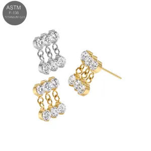 ASTM F-136 Titanium threadless top with triple round CZ crystals and chain dangles in silver and gold.