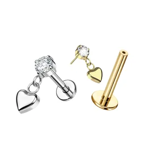 ASTM F-136 Titanium threadless labret with round CZ and heart dangle in high polish and gold finishes, SKU ETP250.