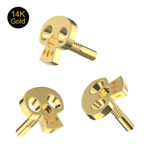 Close-up of a 14K gold polished skull top highlighting the smooth finish and minimalist facial features.
