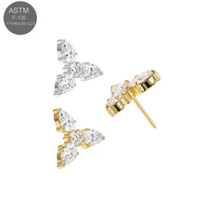 ASTM F-136 Titanium Trinity Threadless Top with Marquise and Round Cubic Zirconia in Plain and Gold PVD options.